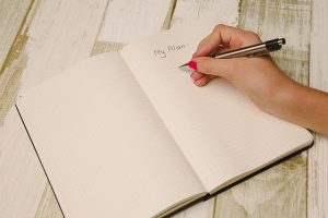 hand writing in journal